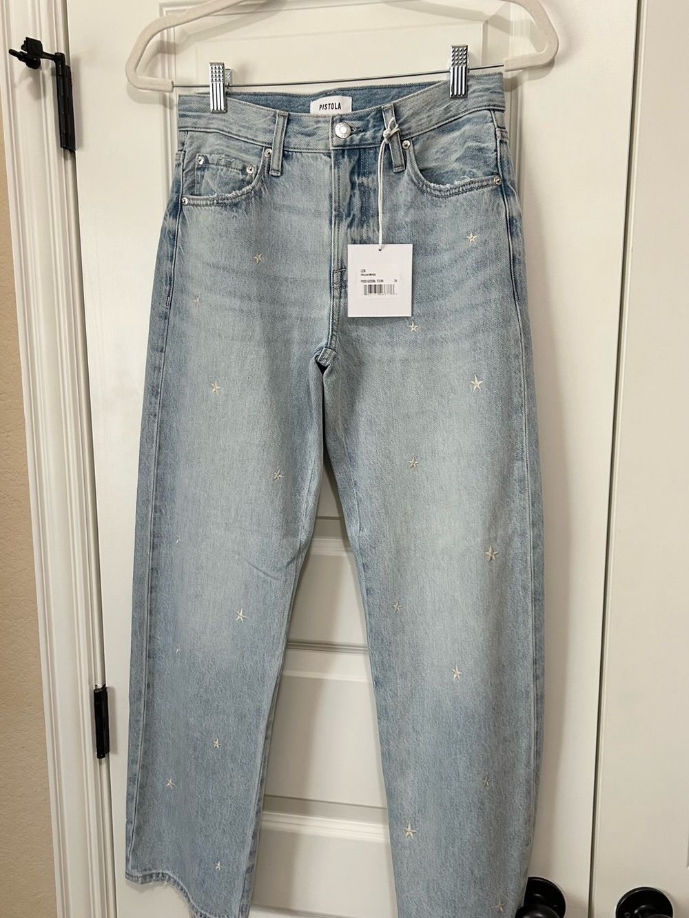 Womens mid rise bowed straight jeans